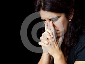 Stressed hispanic woman with a thoughtful look