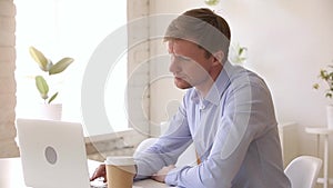 Stressed impatient businessman checking time waiting too long in office