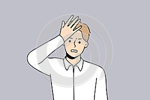 Stressed man make hand gesture remembering something