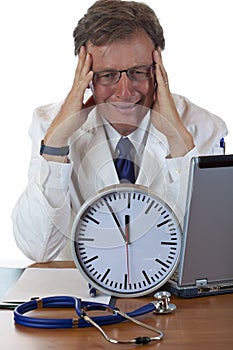 Stressed medical doctor under time pressure