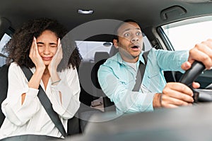 Stressed Middle Eastern Couple Having Risk Of Accident Driving Car