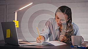 Stressed mother working in home office, quarantine concept.