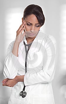 Stressed out female doctor looks upset.