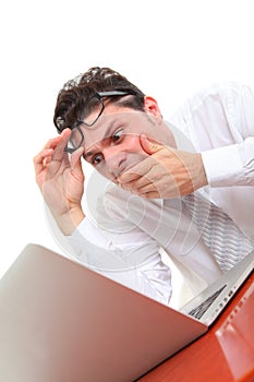 Stressed out man with computer