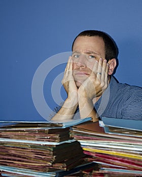 Stressed out man at work.