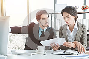 Stressed overwhelmed businessmen are discussing as a team briefing, stress at work concept