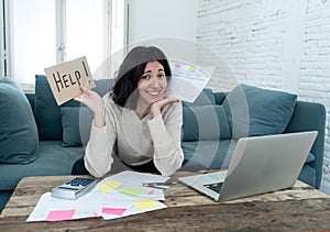 Stressed and overwhelmed young woman accounting home finances paying bills asking for help