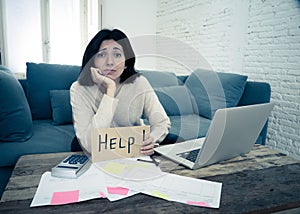 Stressed and overwhelmed young woman accounting home finances paying bills asking for help