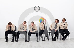 Stressed people waiting for a job interview photo