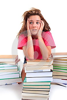 Stressed teenager with books