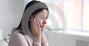 Stressed upset young african woman feeling depressed about problem