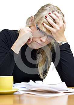 Stressed woman with bills