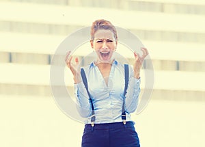 Stressed woman employee having headache screaming in frustration