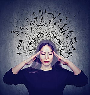 Stressed woman has too many thoughts photo