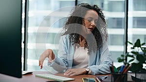 Stressed woman tired work sitting at office desk closeup. Girl worker depressed