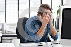 Stressed young businessman photo