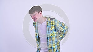 Stressed young man having back pain