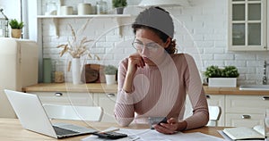 Stressed young woman feeling nervous of financial mistakes.