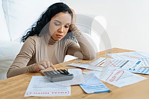 Stressed young woman has financial problems credit card debt to pay crucial