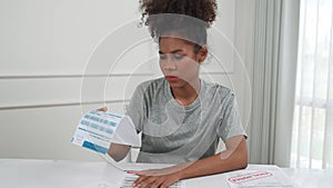 Stressed young woman has financial problems credit card debt to pay crucial