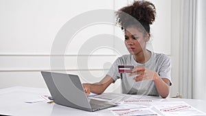 Stressed young woman has financial problems credit card debt to pay crucial