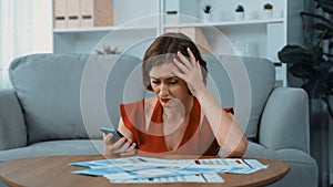 Stressed young woman has financial problems credit card debt to pay. Prim