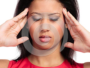 Stressed young woman worried girl suffering from head pain isolated on white. Headache and migraine.