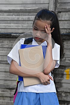 Stressful Beautiful Filipina Person With School Books