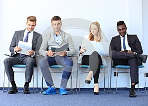 Stressful people waiting for the job interview.