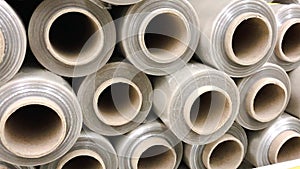 Stretch packaging film in rolls