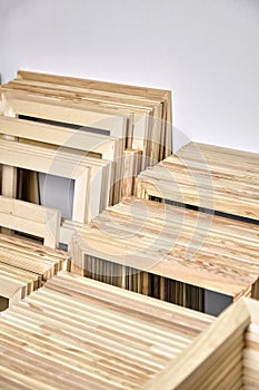 Stretcher bars, stack of wooden frames