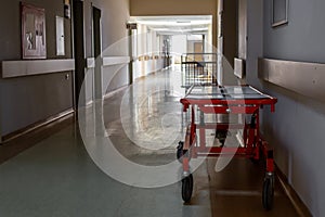 Stretcher and empty hospital corridor