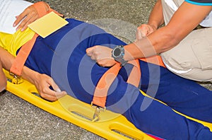 Stretcher yellow and patient injured for emergency paramedic service Injury with medical equipment in emergency rescue situation