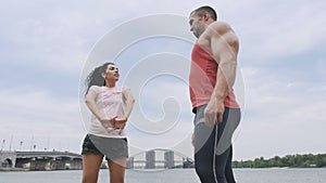 Stretching and conversation near the river