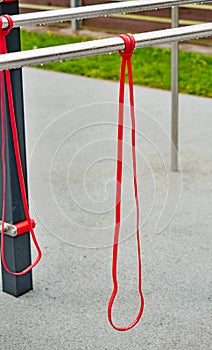 Stretching with elastic band. Exercise soft rubber elastic bands photo