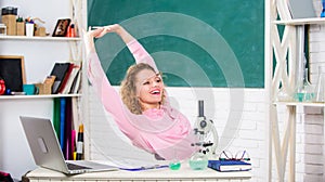 Stretching after hard working day. Teacher adorable woman try to relax in classroom. Just relax. Find way to relax at