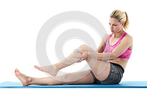 Stretching woman leg.