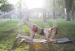 Stretching woman in outdoor exercise smiling happy doing stretch