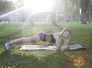 Stretching woman in outdoor exercise smiling happy doing stretch