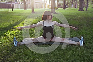 Stretching woman in outdoor exercise smiling happy doing stretch