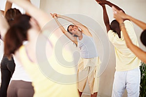 Stretching, yoga and group with personal trainer for class balance, exercise and workout together. Pilates, health club