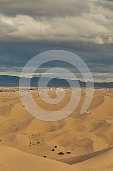 Striated Desert Sand Pattern with Mountains in the background