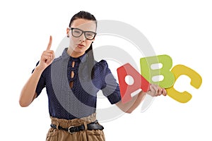 Strict schoolmistress teaching alphabet