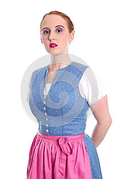 Strict woman isolated in a dirndl