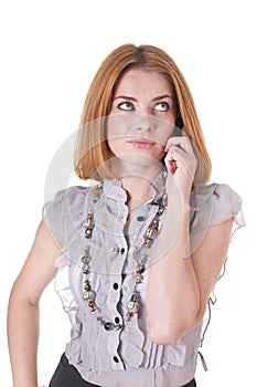 Strict young woman in blouse with mobile phone