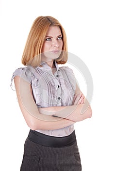 Strict young woman in blouse and skirt