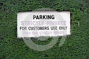 Strictly private car park for customers parking only sign