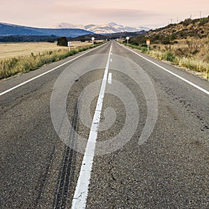 Stright asphalt road in Spain photo