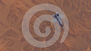 Strike Fighter Jet Aircraft High Altitude Above Arid Mountain Desert with Sediment Mudflat