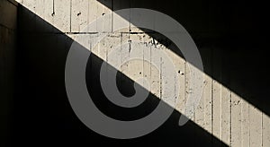 Abstract Sunlight and Shadow on Concrete Wall